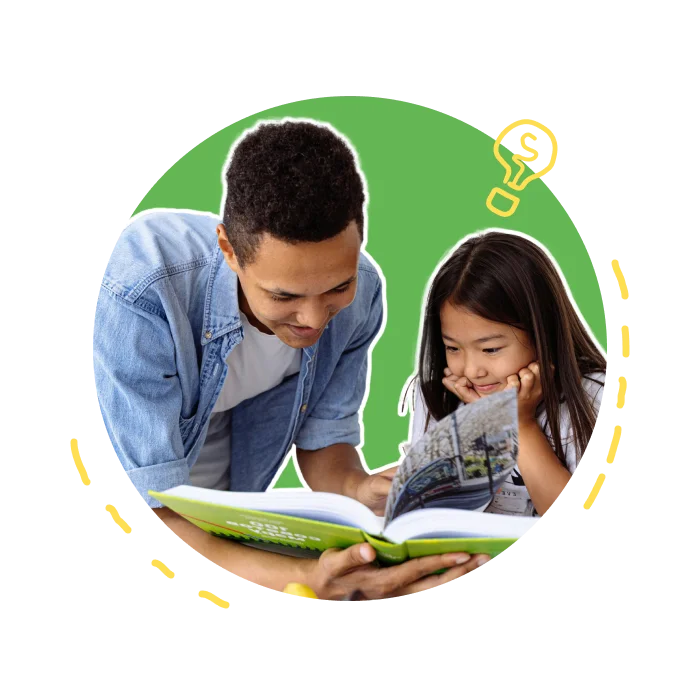 Teacher or parent using guided reading strategies with an elementary student