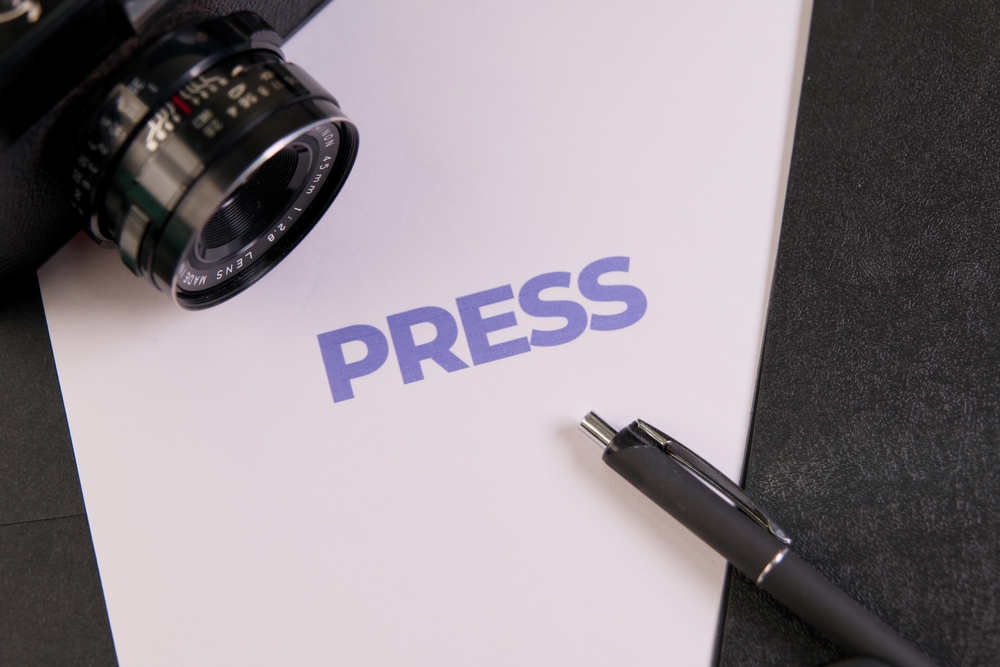 press text on paper with pen and camera