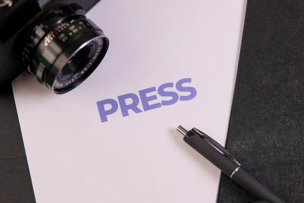 press text on paper with pen and camera