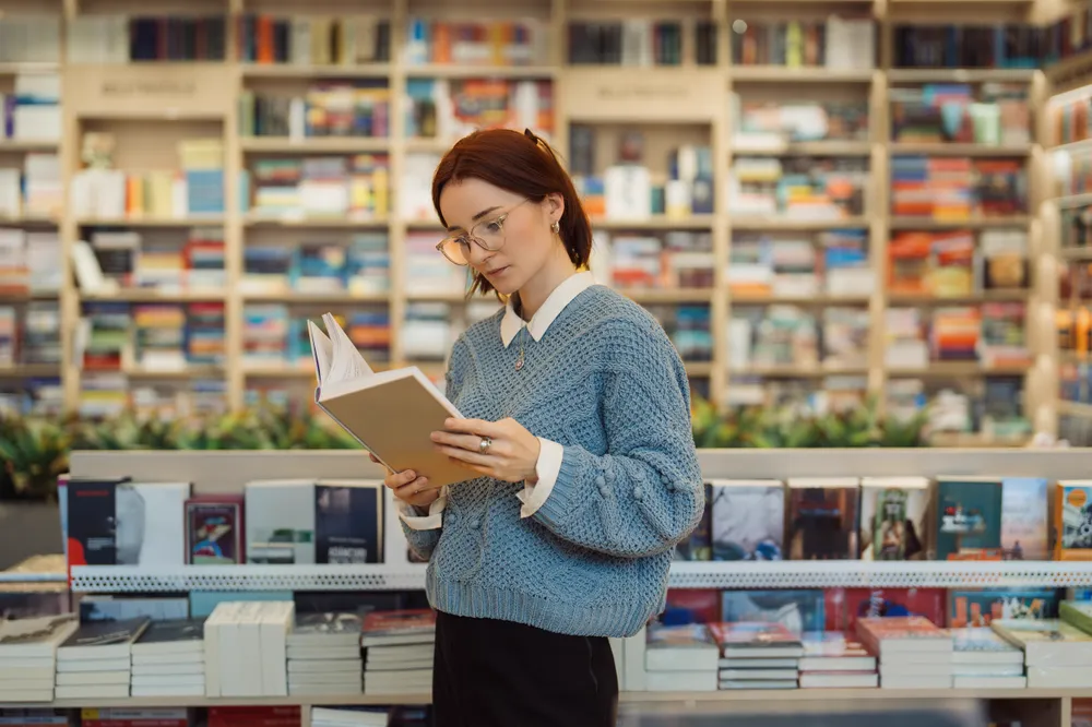 A woman practicing questioning techniques for reading comprehension.