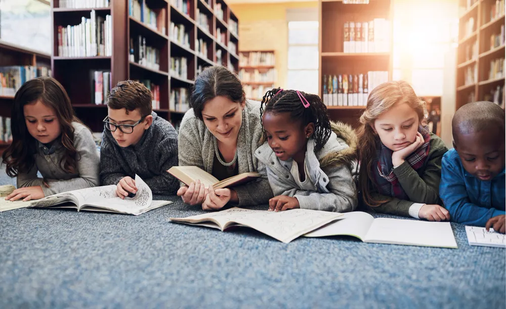 Children improving their reading skills.